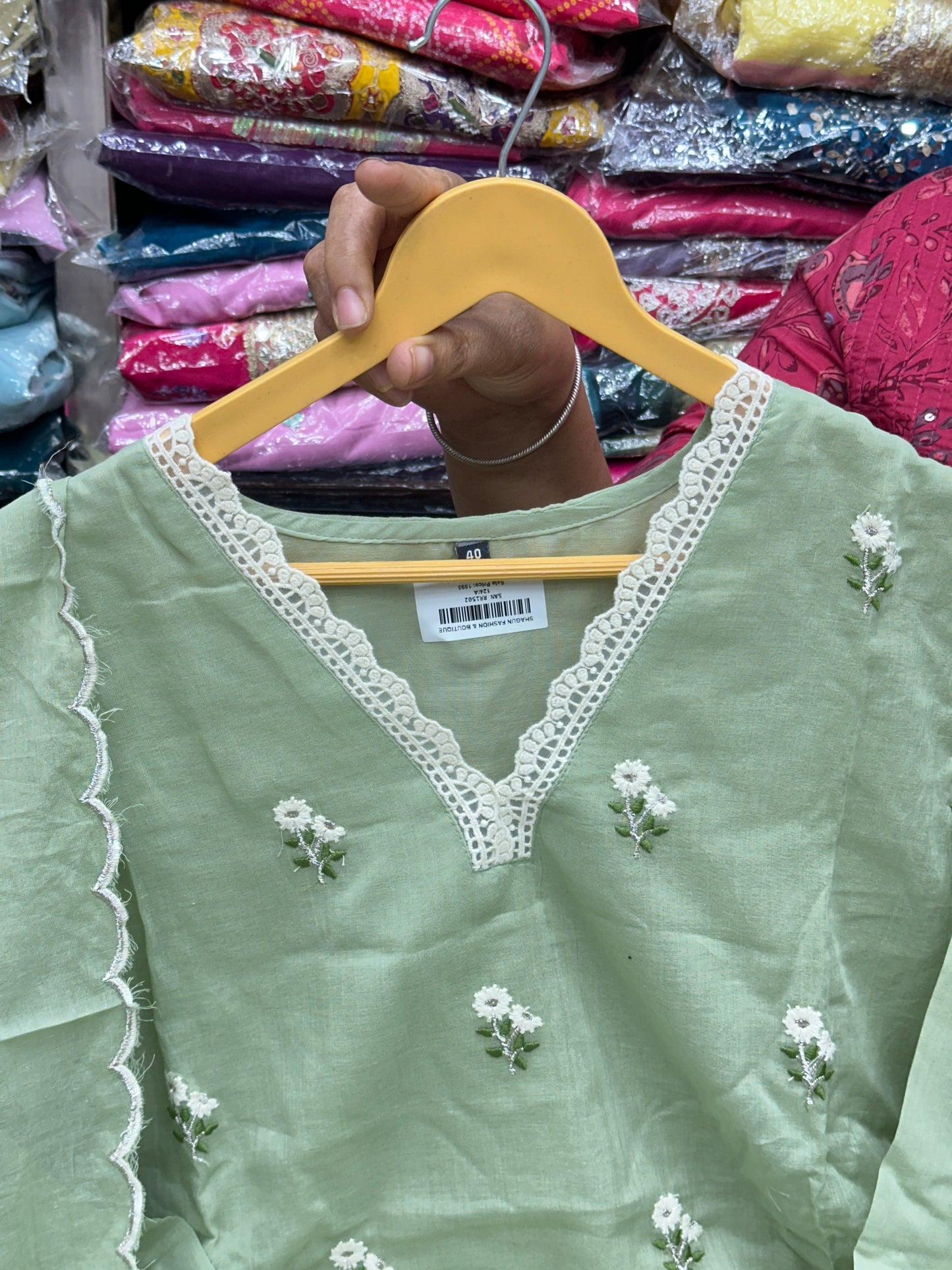 Classy and rich 3 piece kurta set in premium mul cotton fabric with doodle thread work detailing all over the kurta in pista color elegant and comfortable article with lining