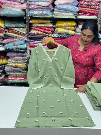 Classy and rich 3 piece kurta set in premium mul cotton fabric with doodle thread work detailing all over the kurta in pista color elegant and comfortable article with lining