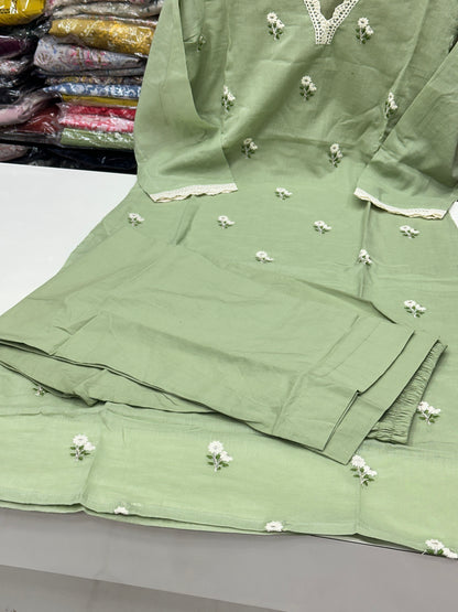 Classy and rich 3 piece kurta set in premium mul cotton fabric with doodle thread work detailing all over the kurta in pista color elegant and comfortable article with lining