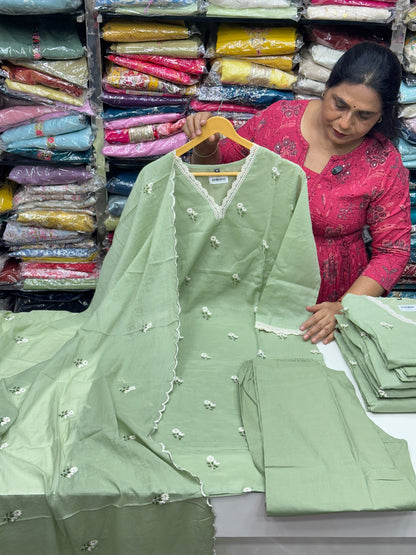 Classy and rich 3 piece kurta set in premium mul cotton fabric with doodle thread work detailing all over the kurta in pista color elegant and comfortable article with lining