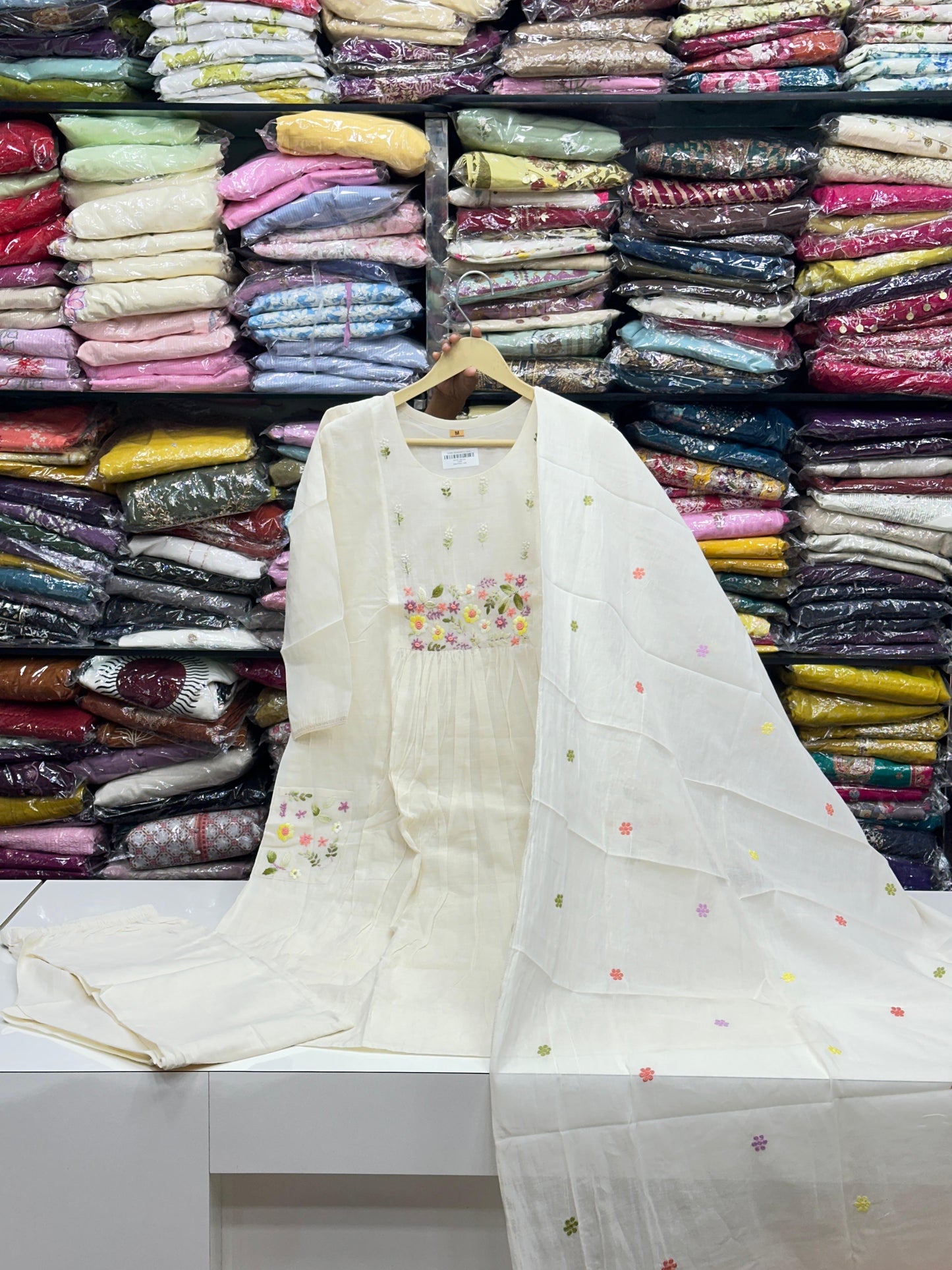 Off-White Doriya Mul Cotton 3-Piece Kurta Set with flower Embroidery & Floral doodle on Dupatta and Pockets | Premium Summer Ethnic Wear for Women