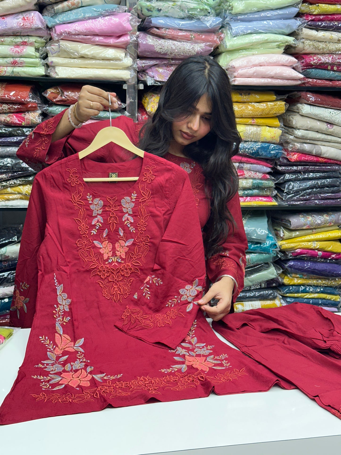 Maroon co-ord in premium rayon fabric with floral thread work detailing
